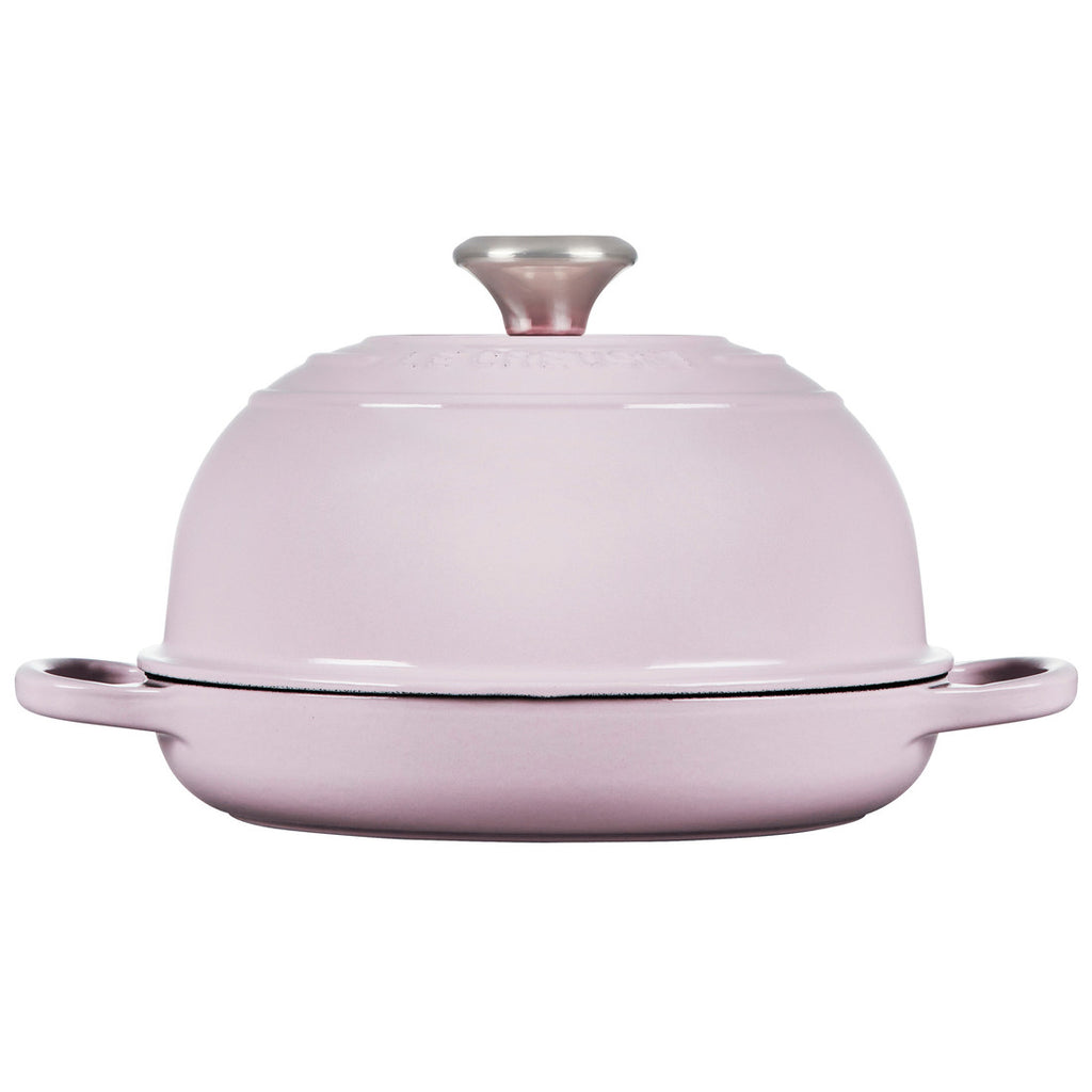 https://www.lascosascooking.com/cdn/shop/products/Le-Creuset-Enameled-Cast-Iron-Bread-Oven-in-Shallot_1024x1024.jpg?v=1682127057